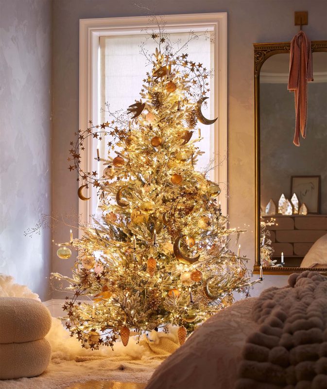 Gold theme, glowing, celestial Christmas tree